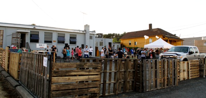 During High Five!, you'll find special art displays and performances in the businesses across from People's Park and an outdoor movie theater in the backyard behind SPUN. (Shown here is the backyard party space during last year's Quadruple Grand Opening.)